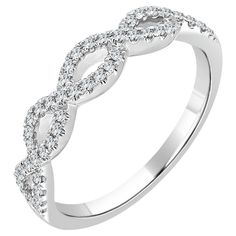 a white gold ring with diamonds on the sides and an intertwined design in the middle