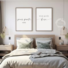 two posters on the wall above a bed in a bedroom with white sheets and pillows