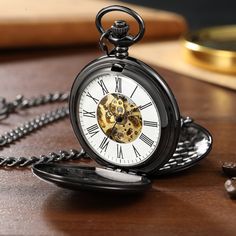 "CLASSY, FASHIONABLE and MODERN, your personalized stainless steel black double hunter pocket watch is the perfect gift for that stylish gentlemen. Made from eco friendly wood with the option for custom engraving, this custom steampunk style pocket watch makes a great gift for the special recipient   Custom engraving is available on either side of your personalized pocket watch. We can engrave letters, numbers symbols or a sweet note to that special gent.  -Packaged for gifting -Case diameter: 1 Black Stainless Steel Watch Accessories As Gift, Black Stainless Steel Timeless Watch Accessories, Vintage Black Watch Accessories, Durable Black Watch As Gift, Black Skeleton Dial Pocket Watch For Formal Occasions, Black Stainless Steel Watch Accessories For Gift, Black Timeless Pocket Watch For Formal Occasions, Vintage Black Watch Accessories For Everyday Use, Timeless Black Stainless Steel Watch Accessories