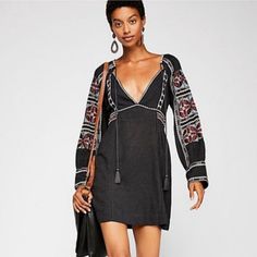 Free People Black, All My Life Embroidered Boho V-Neck Tie Front Tunic Mini Dress With Pockets 52%, Cotton, 48% Viscose New With Tag! Size Extra Small Pit To Pit 21” Length 33” Sleeves 22” #6827 Bohemian V-neck Embroidered Dress For Brunch, Black V-neck Boho Dress For Spring, Bohemian Embroidered Fitted V-neck Dress, Chic V-neck Dress With Floral Embroidery, Festival Fitted V-neck Embroidered Dress, Fitted V-neck Embroidered Festival Dress, Black Bohemian V-neck Dress, Fitted V-neck Embroidered Dress For Festival, Casual Black Boho Dress With V-neck