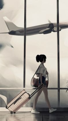 a woman walking with her luggage in front of an airport window and plane taking off