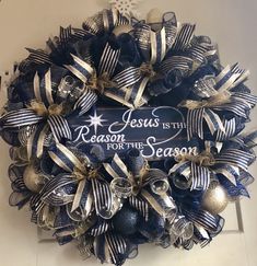 a christmas wreath that says jesus is the reason for the season