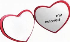 two heart shaped magnets with the words my beloved written on them