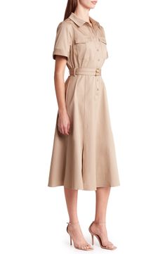 Perfect for work or play, this belted shirtdress is designed with flap pockets and abbreviated cuffed sleeves. 47 1/2" length (size Medium) Button half-placket Spread collar Short sleeves Chest flap patch pockets Removable belt Unlined 100% cotton Hand wash, line dry Imported Classic Belted Shirt Dress For Semi-formal Occasions, Workwear Shirt Dress With Spread Collar And Placket, Short Sleeve Shirt Dress With Buttons For Work, Summer Workwear Shirt Dress With Button Cuffs, Workwear Shirt Dress With Placket, Formal Button-up Shirt Dress With Pockets, Collared Shirt Dress With Placket For Work, Semi-formal Knee-length Shirt Dress With Placket, Knee-length Belted Shirt Dress For Semi-formal