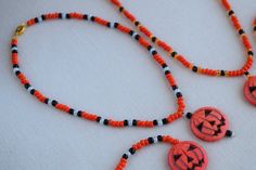 This fun and unique Halloween necklace, choker, bracelet or set makes a great addition to any Halloween costume. They are very nice and well made so you can wear them out or to the office to show that you are in the Halloween spirit. This jewelry set will also make a wonderful gift or party favor for Halloween. Standard length is listed and the bracelets, chokers and necklaces are made with stretchy beading cord so it can fit a larger wrist or neck. I can also add a chain extension if you need m Adjustable Necklaces For Halloween Costume Party, Handmade Adjustable Jewelry For Costume Party, Beaded Jewelry For Halloween Festival, Handmade Jewelry For Halloween Costume Party, Halloween Festival Jewelry With Round Beads, Handmade Costume Jewelry For Halloween, Halloween Gift Jewelry With Round Beads, Handmade Choker Necklace For Halloween, Halloween Gift Beaded Necklaces With Round Beads