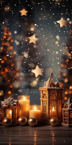 christmas decorations with lit candles and stars in the background