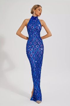 Sleeveless Sequin Dress With Rhinestones For Gala, Sleeveless Sequin Dress With Rhinestones For Evening, Sparkling Sleeveless Gala Evening Dress, Sleeveless Sequined Evening Gown, Sleeveless Evening Gown With Sequins, Glamorous Sleeveless Evening Gown, Glamorous Royal Blue Evening Dress For Prom, Blue Sequined Evening Dress For Gala, Sleeveless Rhinestone Evening Dress For Gala