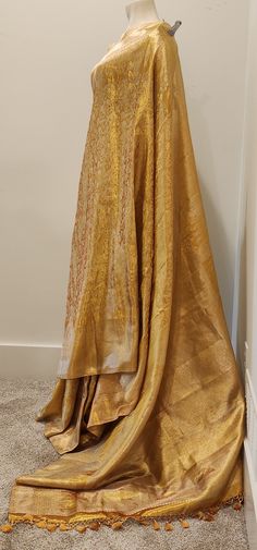 Beautiful Kanchi Silk in Gold Saree W/ Custom Blouse. For Custom Blouse Pls contact us. Free Shipping within the US. Saree ships immediately within the US and the Blouse 2 weeks later. Custom blouse stitching $35. Work blouse available for $99, which shown in the picture. Gold Silk Lehenga With Chikankari Embroidery, Fitted Silk Blouse Piece With Zari Weaving, Bollywood Style Silk Floor-length Blouse Piece, Silk Anarkali Blouse For Formal Occasions, Fitted Brocade Blouse Piece With Dupatta, Fitted Silk Blouse Piece With Dupatta, Gold Silk Blouse With Chikankari Embroidery, Gold Blouse Piece With Chikankari Embroidery, Long Sleeve Blouse Piece With Zari Weaving For Wedding