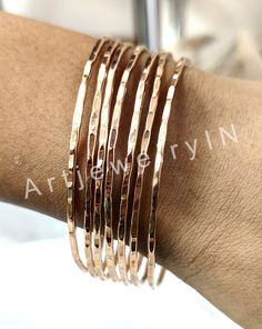 Solid Copper bangles, 7 Set of bangles, Bangles For Woman Hammered bangles Stacking bangles Set, Valentine's Day Gift Unique Copper Jewelry Handmade item Materials: Copper Adjustable : No Style: Minimalist Bracelet Size Inches Circumference/Diameter 7 / 2.23 7.5 / 2.39 8 / 2.55 8.5 / 2.71 9 / 2.87 9.5 / 3 Elegant, , minimal and shiny ! A lovely basic to have in your wardrobe and wear anytime  O T H E R ∙ I N F O R M A T I O N * All items are nicely packaged ready to gift in elegant jewelry boxes. Please store your jewelry away from humidity, the best place being in a jewelry box  IMPORANT NOTE ON BANGLE SIZES  Please see the photo in the listing that shows how to measure for your bangle size. Your bangle size is determined more by the size of your hand than your wrist. To find out your ban Hammered Rose Gold Bangle, Copper Bangles, Stacking Bangles, Hammered Bangles, Copper Jewelry Handmade, Bangles For Women, Bangles Set, Stacked Bangles, Minimalist Bracelet