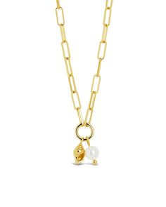 Elevate your style with our Beverly Pearl & Shell Charm Necklace. This charming piece features a delicate pearl and a stunning shell, evoking a luxurious beachy vibe. Make a statement with this exclusive necklace, perfect for any occasion. Material: 14K gold or rhodium plated brass, shell pearls Features: Measures 16" with 2" extender, 0.4" O ring, 0.55" charms, 7mm pearl, 4mm chain, Lead & Nickel free, lobster clasp Shell Charm Necklace, Brass Shell, Solid Gold Bracelet, Solid Gold Earrings, Gold Charm Necklace, Statement Drop Earrings, Mens Accessories Jewelry, Men Earrings, Pearl Shell