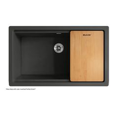 the black sink has a wooden cutting board in it's side panel and is ready to be used for cooking