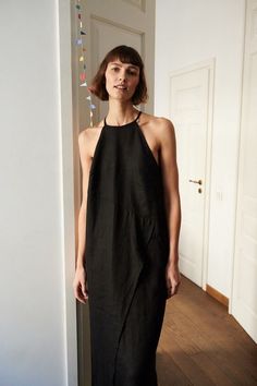 Black Linen Spaghetti Strap Dresses, Black Sleeveless Linen Dress For Spring, Sleeveless Black Linen Dress For Spring, Chic Black Linen Dress For The Beach, Chic Black Linen Beach Dress, Black Sleeveless Linen Dress For Summer, Chic Black Sleeveless Linen Dress, Chic Black Linen Dress, Black Linen Beach Dress For Summer