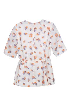 This sweet and lightweight top by Emilia Wickstead is just what you need to feel sweet and stylish. The orange and lavender floral print adds a dainty touch to this classic style. Pair with jeans and a crossbody bag for a more cute and casual look for your Sunday afternoon outing. Size 2 Shell: 39% Silk, 33% Viscose, 17% Polyamide, 11% Polyester Lining: 100% Silk Concealed back zipper Fully lined Peplum silhouette Round neckline Short sleeves Bust 29" Waist 24" Shoulder to hem 24" Chic Orange Printed Top, Orange Printed Tops For Spring, Spring Orange Printed Tops, White Fitted Ditsy Floral Print Blouse, White Fitted Blouse With Ditsy Floral Print, Feminine Orange V-neck Top, White Ditsy Floral Print Blouse, White Ditsy Floral Print Short Sleeve Top, Orange Relaxed Fit Blouse With Floral Print