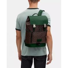 Rectangular Backpack With Leather Trim And Coated Canvas, Rectangular Coated Canvas Backpack With Leather Trim, Luxury Coach Backpack For School, Designer Coach Rectangular Backpack, Designer Rectangular Coach Backpack, Rectangular Coach Travel Backpack, Designer Coach Backpack, Coach Coated Canvas Standard Backpack, Coach Men