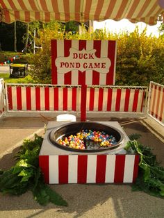 there is a fake candy bar in the shape of a pool game on display at an amusement park