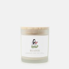 a candle that reads reader candles for the soul in front of a white background with an image of a bird on it