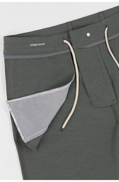 With the look of flat-front chinos and the performance features of swimwear, these hybrid shorts easily take you from the beach to the bar and beyond. The quick-drying technical fabric is made with recycled fibers, plenty of stretch and a hint of cotton for softness. 8" inseam; 10 1/2" front rise Zip fly with button closure; interior drawcord Front slant pockets; back-zip welt pockets Four-way-stretch fabric Mesh pocket linings 75% recycled polyester, 17% cotton, 8% spandex Machine wash, tumble Functional Bottoms With 5-inch Inseam For Summer, 4-way Stretch Shorts With Drawstring For Outdoor, Outdoor Shorts With Functional Drawstring And 4-way Stretch, Moisture-wicking Midweight Athletic Shorts For Summer, Midweight Moisture-wicking Shorts For Summer, Summer Moisture-wicking Midweight Athletic Shorts, Summer Midweight Moisture-wicking Athletic Shorts, Fitted Moisture-wicking Swim Trunks For Outdoor, Moisture-wicking Fitted Swim Trunks For Outdoor