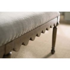 an upholstered bench is shown in this image