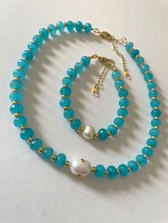 Parisian blue necklace and bracelet – Vita Ambita Handmade Necklace Tutorial, Carrie Necklace, Parisian Blue, Turquoise Crystals, Neck Pieces Jewelry, Parisienne Chic, Beaded Jewelry Necklaces, Turquoise Crystal, Heart Hoop Earrings