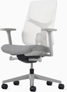 an office chair with wheels on the back and seat upholstered to the side