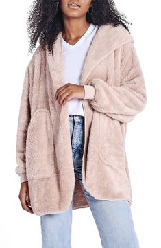 If a comfy robe and cozy blanket got together they'd create this wonderfully plush hooded wrap that's perfect for couch snuggles and coffee-shop hangouts. 32" length (size Small) Fixed hood Long sleeves 100% polyester Machine wash, line dry Imported Oversized Super Soft Outerwear For Loungewear, Comfy Super Soft Loungewear Outerwear, Cozy Solid Outerwear For Loungewear, Comfy Super Soft Outerwear For Loungewear, Cozy Solid Color Outerwear For Loungewear, Super Soft Winter Outerwear For Loungewear, Cozy Snug Outerwear For Loungewear, Snug Cozy Loungewear Outerwear, Comfortable Super Soft Winter Outerwear