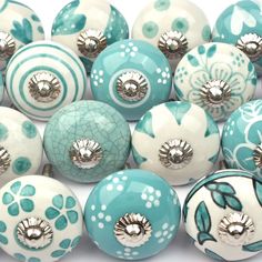 blue and white ceramic ornaments with silver accents