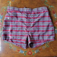 Vintage mens red and blue plaid swim shorts. Inner lining is kind of stretched out, otherwise on good condition. 31" waist, 13 1/2" length. Fitted Cotton Swim Trunks For Poolside, Summer Cotton Lined Bottoms, Lined Cotton Bottoms For Summer, Summer Lined Cotton Bottoms, Fitted Cotton Swim Trunks, Plaid Cotton Shorts For Beach, Plaid Cotton Beach Shorts, Plaid Cotton Shorts For The Beach, Retro Summer Lined Bottoms