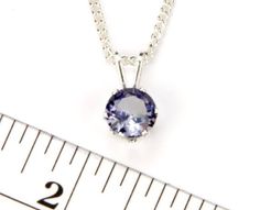 This gorgeous purple alexandrite necklace set in a 925 sterling silver pendant is the perfect gift by itself or for layering with another necklace. The 6mm (1/4”) alexandrite gemstone is lab created and is the June birthstone. It's complimented with a 1/10 silver filled curb chain, available in 16”, 18" or 20” length.► Sterling silver pendant with 6mm Alexandrite gemstone► 16”, 18”, 20 " silver filled curb chain, choose from menu► Matching Alexandrite stud earrings available► Free gift box and d Tanzanite Faceted Necklace For Gift, Gift Tanzanite Faceted Necklace, Lavender Tanzanite Jewelry For Gifts, Round Lavender Tanzanite Jewelry, Lavender Tanzanite Round Jewelry, Lavender Tanzanite Jewelry, Alexandrite Necklace, Alexandrite Gemstone, June Birthstone Jewelry