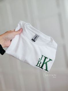 Personalize these tee's with your little ones initials. Choose from several different monogram designs! Made on a Gildan Youth t-shirt 50/50 cotton/polyester. If interested in a custom order or design please message us and we will be happy to help! Because these are one of a kind, returns are not accepted. Each item is made to order. We are unable to replace/refund purchases based on color and font selections, so please make sure to be very specific and make the correct selections when ordering. Monogram T Shirts, Name Embroidery, Monogram Design, Tshirt Design, Kids Tops, 50 50, Custom Name, Kids Shirts, Custom Orders