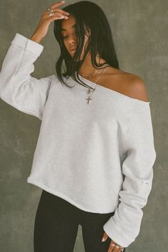 Oversized, off-the-shoulder pullover with a wide neckline and raw hem. Custom knit french terry fabric Brushed mid-weight cotton - ideal for layering Soft, comfortable and made to last Color: Pearl Grey French Terry Sizing: S/M (0-4), M/L (6-10) Model is 5'8" and wearing size S/M Fabric: 98% Cotton, 2% Polyester Care: Machine Wash Cold With Like Colors.Care: Tumble Dry Low. JOAH BROWN | MADE IN LOS ANGELES Fall Drop Shoulder Top For Lounging, Cozy Drop Shoulder Everyday Top, Cozy Drop Shoulder Tops For Everyday, Drop Shoulder Cropped Sweater For Loungewear, Casual Drop Shoulder Lounging Top, Cozy Drop Shoulder Tops For Layering, Casual Oversized Boat Neck Top, Oversized Off-shoulder Loungewear Top, Relaxed Fit Cropped Sweater With Drop Shoulder For Loungewear