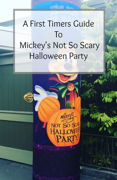 mickey's not so scary halloween party sign in front of a house with text overlay reading a first timer guide to mickey's not so scary halloween party