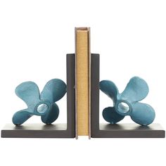 a bookend that has a blue flower on it