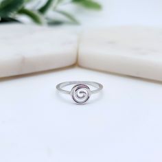 .925 Sterling Silver Delicate Spiral Ring This cute spiral ring is super delicate with a 1mm band, made out of solid 925 sterling silver and features an infinite spiral/swirl representative of the 'infinite' in all that is. Great as a stacking ring with others or simple on its own. Top of ring width: 8mm Band width: 1mm Ring Size: 5,6,7,8,9,10 For a much thicker/chunkier version of this ring see here: https://www.etsy.com/au/listing/604553284/sterling-silver-spiral-ring-cute-silver 💎 LISTING IS Minimalist Spiral Rings For Everyday, Adjustable Spiral Midi Rings In Minimalist Style, Minimalist Everyday Spiral Rings, Silver Spiral Midi Rings As Gift, Modern Twist Spiral Stackable Rings As Gift, Minimalist Spiral Promise Ring, Minimalist Spiral Stackable Rings, Minimalist Sterling Silver Spiral Ring, Minimalist Spiral Sterling Silver Ring