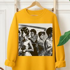 This adult unisex sweatshirt features black women entering or exiting an unknown space. Inspired by vintage style, glamour and beauty, it’s a soft top and offers a comfortable feel. The material is 50% cotton and 50% polyester; however, fabric content may vary based on the color sweatshirt you select. Available in multiple sizes and colors. Check the included measurement chart for just the right fit. An excellent gift for us. Black Women Fashion 2024, Sweat Shirt Outfits With Jeans, 2025 Fashion Trends Forecast, Adult Emo Fashion, French Women Style Over 50, Vintage Thrift Shop Aesthetic, Sweater Over Shirt, 30 Year Old Fashion Women, Black Women 70s