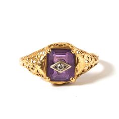 Delicate 14k yellow gold filigree ring set with medium colored amethyst and small round diamond (not tested) in white gold rhombus. Good antique condition with no wear to stone and slight crimping in filigree. Amethyst measures 7mm x 6mm. US size 6. Does not look to have ever been resized. Stamped with makers mark and 14K on inner band. Heirloom 14k Gold Purple Birthstone Ring, Heirloom Purple Birthstone Ring In 14k Gold, Purple Heirloom Birthstone Ring In 14k Gold, Heirloom Purple Diamond Ring, Heirloom Amethyst Birthstone Ring, Purple Rose Cut Diamond Rings In 14k Gold, Purple 14k Gold Ring With Rose Cut Diamonds, Purple 14k Gold Rings With Rose Cut Diamonds, Heirloom Purple Ring With Rose Cut Diamonds