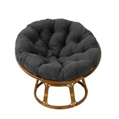 a round chair with a black cushion on it