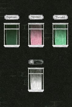 four windows with different colored curtains on them in front of a brick building at night