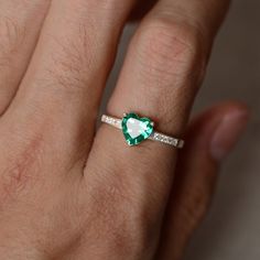 This is a gorgeous handmade creation. Its beauty is its simplicity & Elegance. The 7*7mm heart shape faceted lab emerald is crafted in solid sterling silver and with rhodium plated. All item is sent in a beautiful gift box You can realize more lovely stuff clicking the link https://www.etsy.com/shop/knightjewelry?refshopsection_shophome_leftnav Please leave your PHONE NUMBER for delivering successfully, it is used only for shipping. Heart-shaped Green Emerald Ring For May Birthstone, Heart-shaped Emerald Jewelry With Birthstone, Heart Shaped Green Emerald Ring For May Birthstone, Heart-shaped Emerald Birthstone Jewelry, Green Heart-shaped Ring For May Birthstone, Heart Cut Emerald Jewelry For May Birthstone, Emerald Heart-shaped Anniversary Rings, Green Heart Ring For Anniversary, Emerald Heart Shaped Anniversary Rings