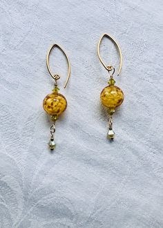 Amber Venetian Glass and Swarovski Crystals Earrings-SugarJewlz Handmade Jewelry Gold Beaded Glass Earrings, Elegant Amber Round Bead Earrings, Gold Glass Earrings With Dangling Beads, Amber Czech Glass Dangle Earrings, Amber Czech Glass Drop Earrings, Gold Wire Wrapped Glass Earrings, Elegant Yellow Wire Wrapped Earrings, Gold Czech Glass Beaded Earrings, Gold Beaded Dangle Earrings With French Hook