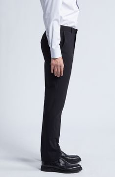 Smart and versatile, these dress pants tailored from polished wool feature a touch of stretch to keep you moving comfortably at any formal occasion. 36 1/2" inseam; 15" leg opening; 9 1/2" front rise; 15" back rise (size 30) Zip fly with hook-and-bar closure Front slant pockets 96% wool, 4% elastane Dry clean Imported Stretch Ankle-length Dress Pants For Semi-formal Occasions, Stretch Dress Pants For Work With Straight Hem, Elegant Ankle-length Dress Pants With 4-way Stretch, Elegant 4-way Stretch Ankle-length Dress Pants, Elegant Ankle-length 4-way Stretch Dress Pants, Tailored Black Elastane Dress Pants, Black Tailored Elastane Dress Pants, Modern Tailored Dress Pants For Office, Straight Dress Pants With Welt Pockets And 4-way Stretch