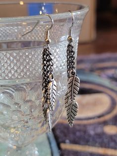 Dangle/Drop earrings made with chain and feather charms Feather Dangle Earrings, Party Feather Dangle Jewelry, Bohemian Dangle Earrings With Feathers, Feather Charm Earrings, Silver Bohemian Feather Earrings, Feather Charms, Jewelry Earrings Dangle, Etsy Earrings, Dangle Drop Earrings