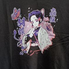 a black shirt with an anime character on it