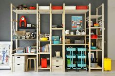 a room filled with lots of different types of furniture and decor on top of shelves