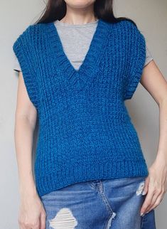 Knitted women v neck vest /knit wool turquoise vest.  This vest was knitted from wool yarn.  It is very soft, warm.   The color is very unusual turquoise with melange. It is very soft and 100% original. Materials that I use high quality.  It is suitable with different kinds of clothes.   So I'm sure you'll love it One Size fit s,m, l Care of the product Only hand wash. Wash a water temperature of 30oC. Lay on a flat surface to dry, do not tumble dry. V Neck Knit Vest, Vest Knit, Grey Knit Cardigan, Oversized Vest, Vest Women, Knitted Vest, Wool Vest, Kinds Of Clothes, Vest Outfits