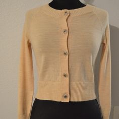 H & M B02 Great Condition New Without Tags 100% Wool Merino. Size= M Approx. Bust= 19.5" Sleeve= 25.5" Neck To Hemline Length= 19.5" Shoulder To Hemline. ***Check Out My Other Items!*** Thank You. Cream Fitted Long Sleeve Cardigan, Fitted Cream Long Sleeve Cardigan, Fitted Long Sleeve Cream Cardigan, Fitted Cream Sweater With Buttons, Fitted Cotton Sweater With Buttons, Classic Fitted Sweater With Button Closure, Cream Fitted Button-up Sweater, Fitted Cream Button-up Sweater, Fitted Sweater For Spring Daywear