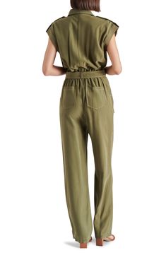 Rock a polished utilitarian vibe in this brushed-twill straight-leg jumpsuit updated with abbreviated sleeves and plenty of pockets. 31" inseam (size Small) Front button closure Spread collar Short sleeves Removable belt Chest flap-patch pocket; front scoop bellows pockets; back patch pockets Unlined 92% rayon, 8% polyester Hand wash, dry flat Imported Khaki Utility Overalls For Workwear, Belted Utility Jumpsuit For Workwear, Spring Cargo Style Fitted Jumpsuits And Rompers, Cargo Style Jumpsuits And Rompers For Spring, Utility Belted Jumpsuit For Workwear, Fitted Cargo Style Jumpsuits For Spring, Fitted Cargo Style Jumpsuits And Rompers For Spring, Casual Fall Jumpsuits And Rompers With Patch Pockets, Utility Relaxed Fit Jumpsuit In Solid Color