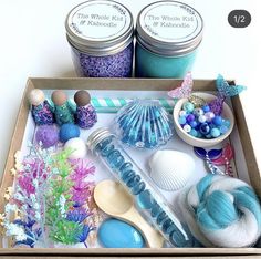 the contents of a craft kit are displayed in a box with spoons and other items