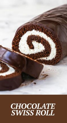 the chocolate swiss roll is cut in half and ready to be eaten