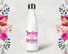 a white water bottle with the words sweating for the wedding printed on it next to flowers