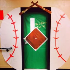 a baseball themed classroom door is decorated